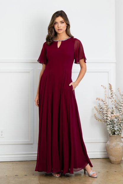 3468 - Chiffon gown with bell sleeves and beaded neckline. Fully lined with back zipper & pockets.