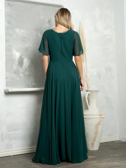 3468 - Chiffon gown with bell sleeves and beaded neckline. Fully lined with back zipper & pockets. - Image 3